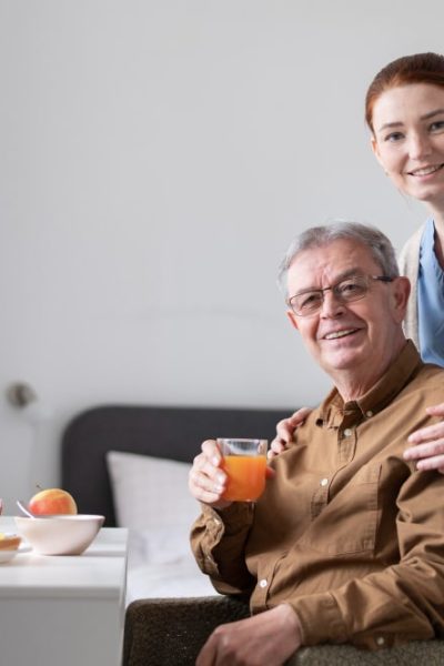 medium-shot-nurse-man-posing-3-min